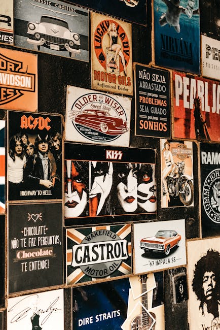 A collage of iconic rock band posters and vintage advertisements on a textured wall.